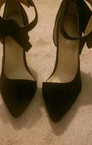 Black strappy high heels